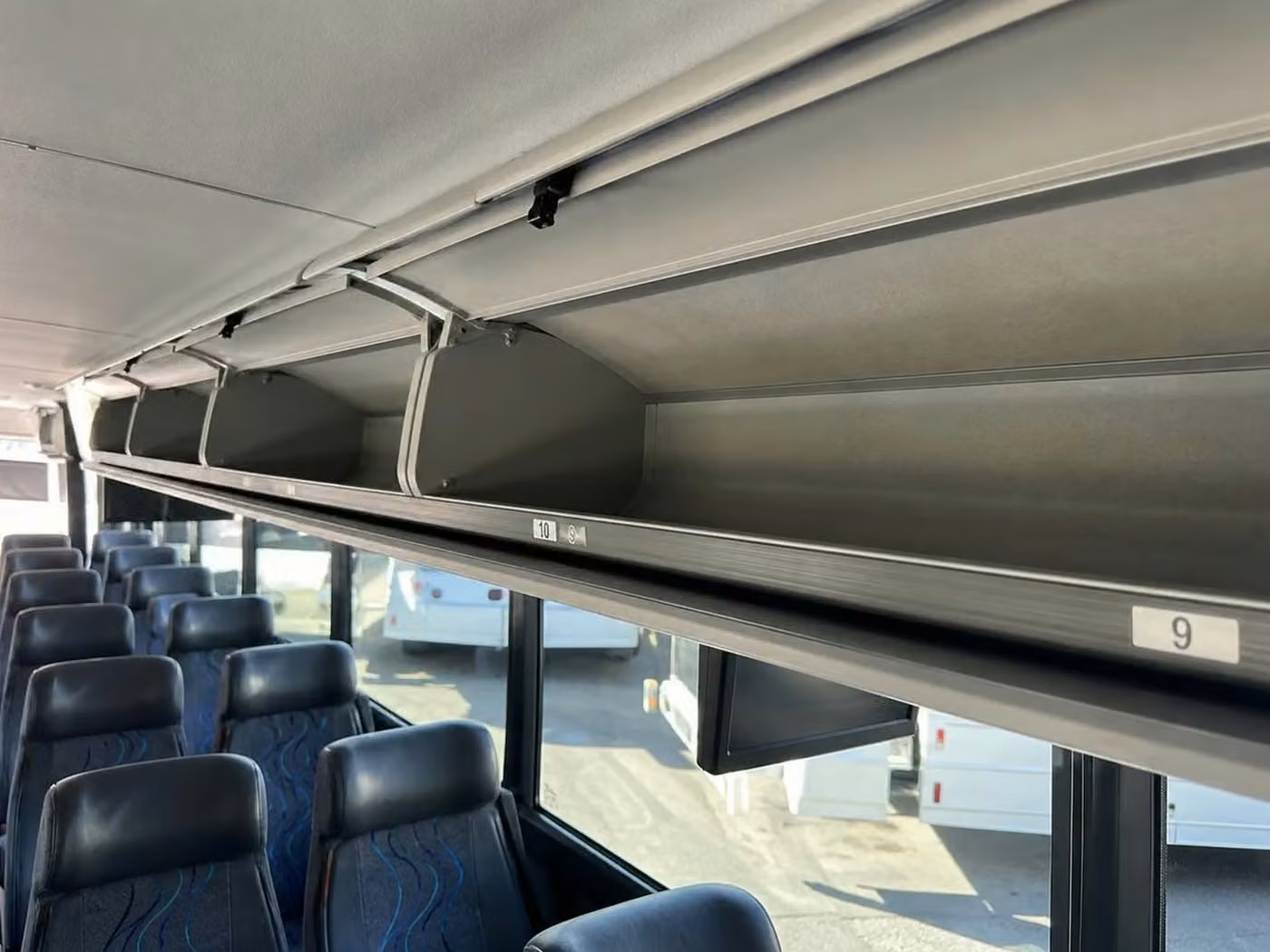 torrington 25 passenger minibus overhead storage