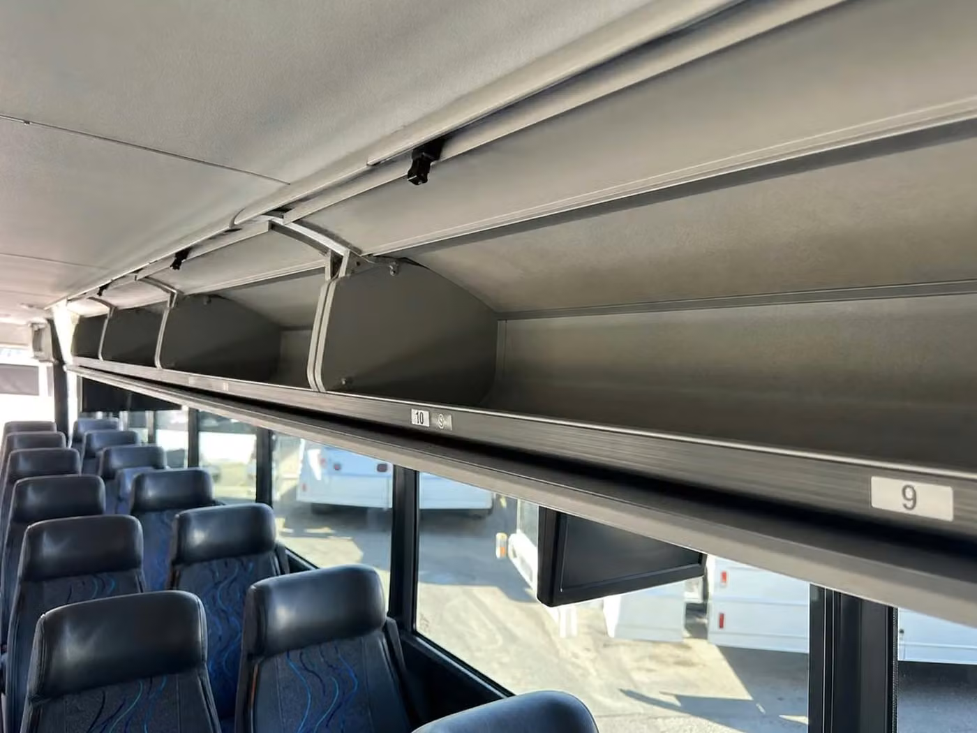 torrington charter bus overhead storage